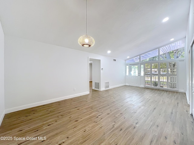 unfurnished living room featuring vaulted ceiling, baseboards, wood finished floors, and recessed lighting