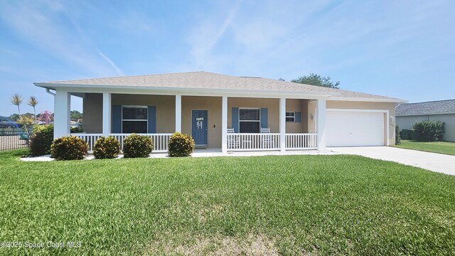 5290 Cinnamon Fern Blvd, Cocoa, FL 32927 - view of front of property with covered porch, an attached garage, stucco siding, and concrete driveway