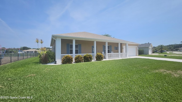 5290 Cinnamon Fern Blvd, Cocoa, FL 32927 - view of front of property with a porch, a garage, concrete driveway, and stucco siding