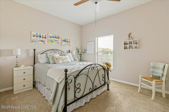 5290 Cinnamon Fern Blvd, Cocoa, FL 32927 - bedroom with light carpet, baseboards, and a ceiling fan