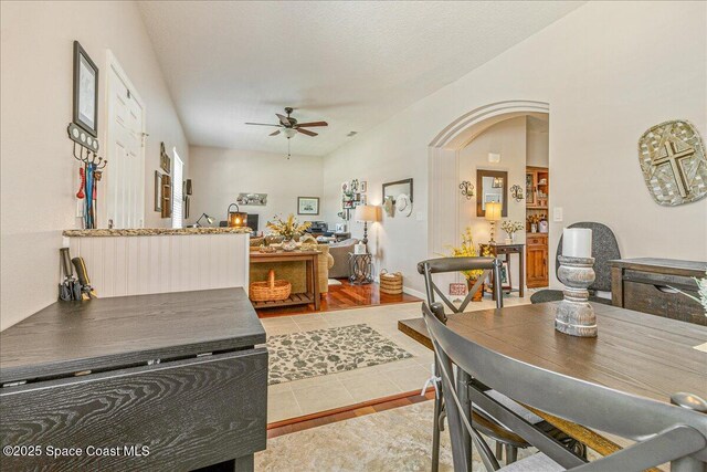 5290 Cinnamon Fern Blvd, Cocoa, FL 32927 - tiled dining room featuring ceiling fan and arched walkways