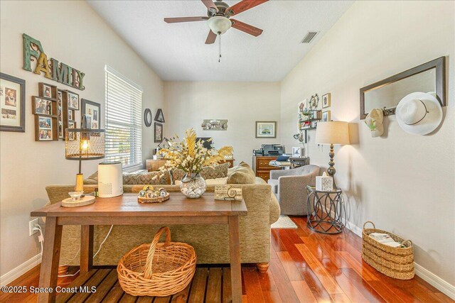 5290 Cinnamon Fern Blvd, Cocoa, FL 32927 - living area featuring wood-type flooring, a ceiling fan, and baseboards