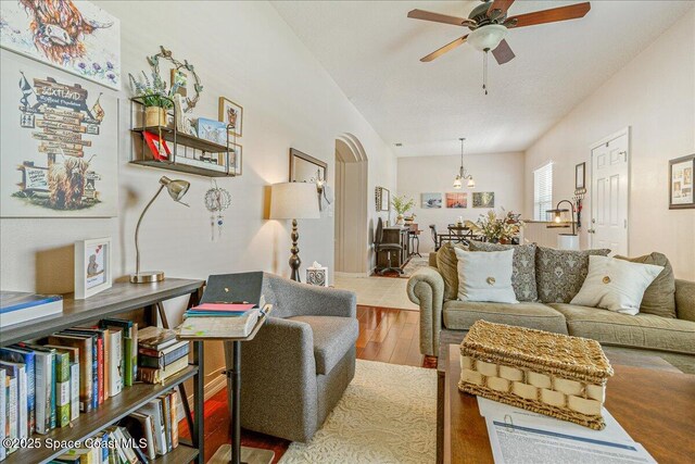 5290 Cinnamon Fern Blvd, Cocoa, FL 32927 - living area with ceiling fan, wood finished floors, and a chandelier
