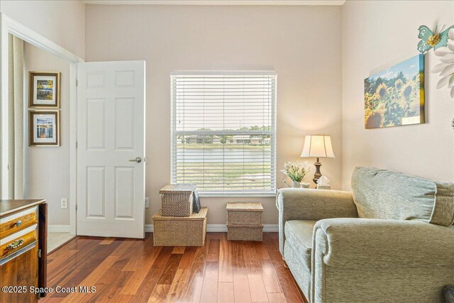 5290 Cinnamon Fern Blvd, Cocoa, FL 32927 - sitting room with hardwood / wood-style floors and baseboards
