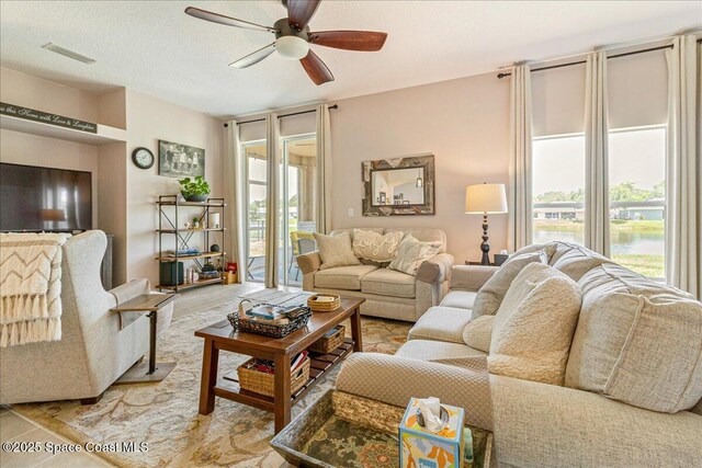 5290 Cinnamon Fern Blvd, Cocoa, FL 32927 - living room featuring plenty of natural light and a ceiling fan