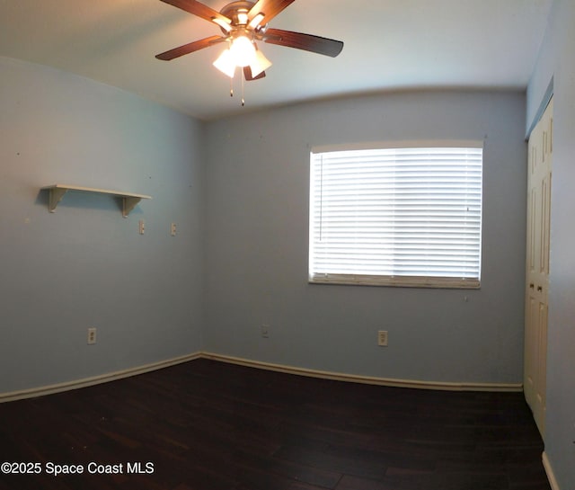 1581 Charles Blvd NE, Palm Bay, FL 32907 - spare room featuring wood finished floors, a ceiling fan, and baseboards