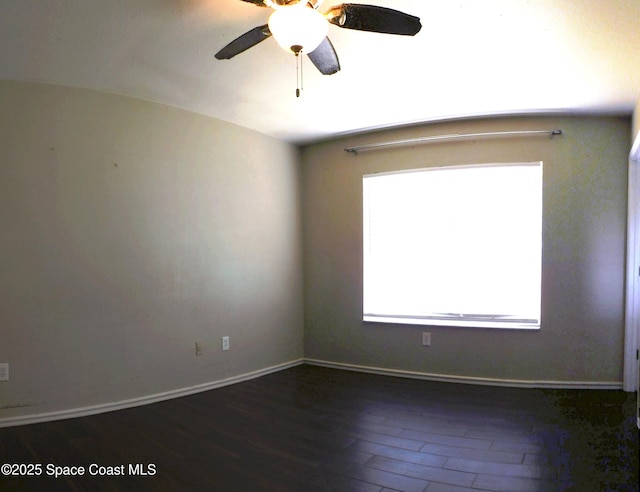 1581 Charles Blvd NE, Palm Bay, FL 32907 - empty room featuring wood finished floors, ceiling fan, and baseboards