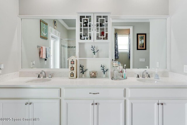 5250 Riveredge Dr, Titusville, FL 32780 - bathroom with double vanity and ornamental molding