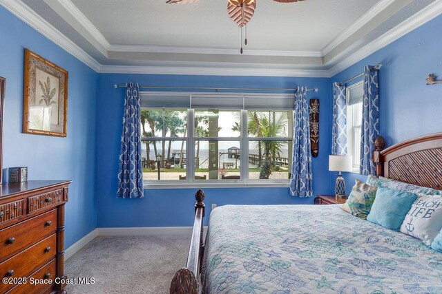 5250 Riveredge Dr, Titusville, FL 32780 - carpeted bedroom with crown molding and baseboards