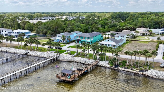 5250 Riveredge Dr, Titusville, FL 32780 - aerial perspective of suburban area with a large body of water