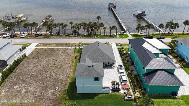 5250 Riveredge Dr, Titusville, FL 32780 - aerial view of property and surrounding area featuring a nearby body of water