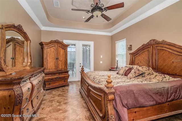 20880 Reynolds Pkwy, Orlando, FL 32833 - bedroom with access to exterior, a tray ceiling, french doors, a ceiling fan, and crown molding