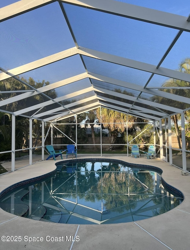 2007 Oak St, Melbourne Beach, FL 32951 - outdoor pool with a patio and glass enclosure