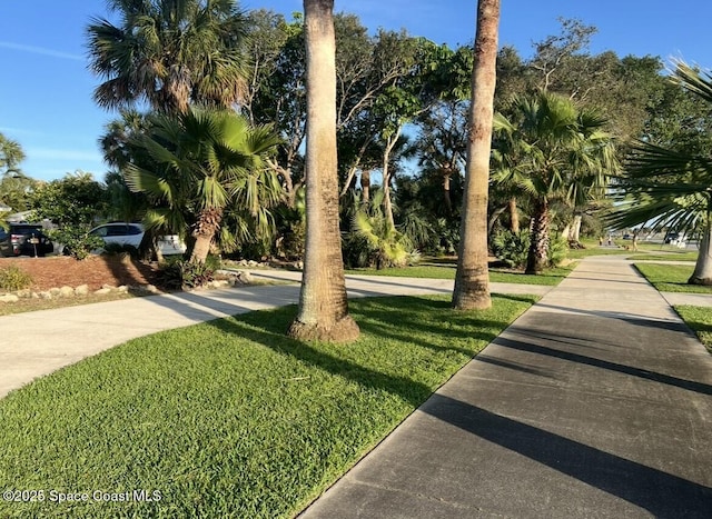 2007 Oak St, Melbourne Beach, FL 32951 - view of community with a lawn