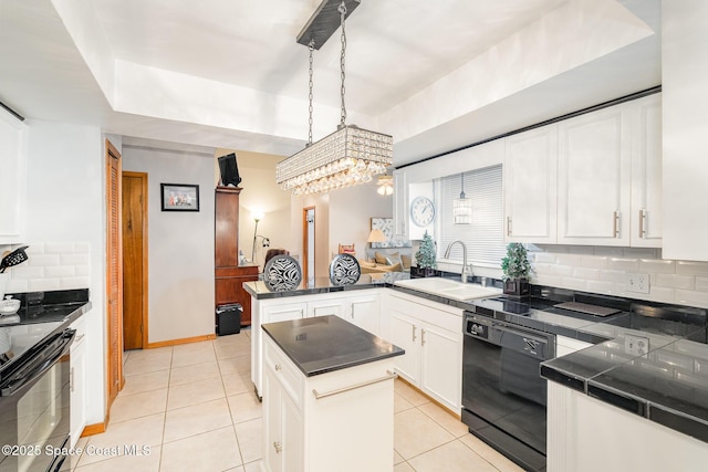 6855 Bryant Rd, Cocoa, FL 32927 - kitchen with black appliances, a peninsula, a sink, dark countertops, and tasteful backsplash