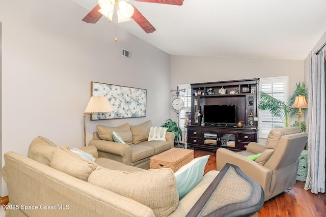 6855 Bryant Rd, Cocoa, FL 32927 - living area featuring lofted ceiling, wood finished floors, and ceiling fan
