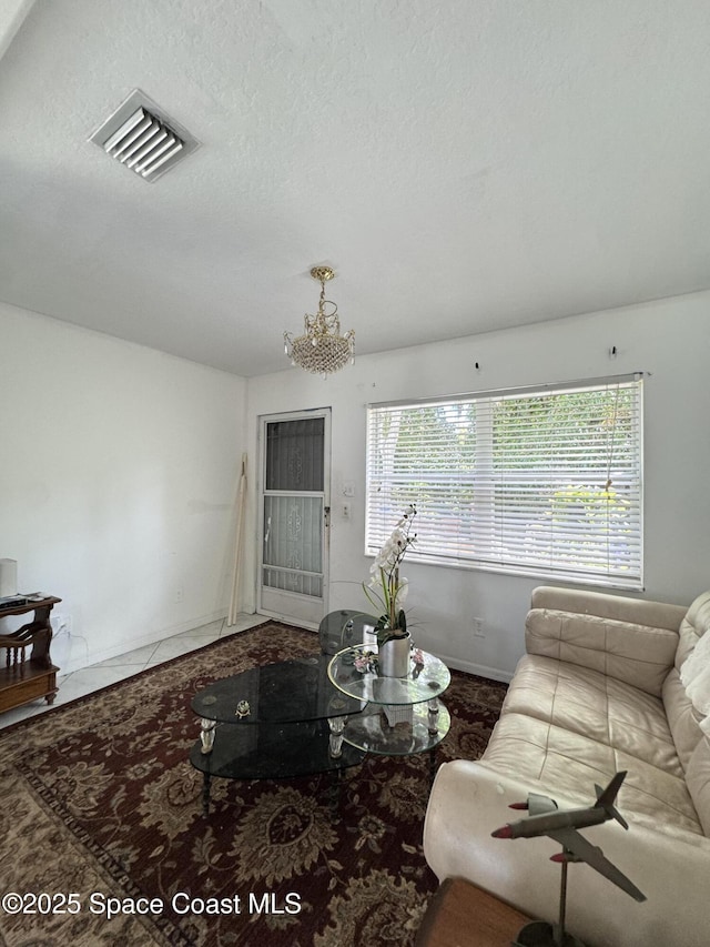 1112 Pine Creek Cir NE, Palm Bay, FL 32905 - living area with baseboards and a textured ceiling