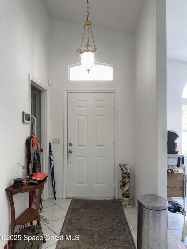 1112 Pine Creek Cir NE, Palm Bay, FL 32905 - foyer featuring light tile patterned flooring