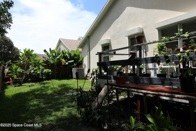 1112 Pine Creek Cir NE, Palm Bay, FL 32905 - view of yard with cooling unit