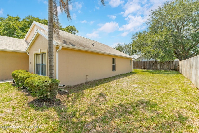 854 Belhurst Ln, Rockledge, FL 32955 - view of side of home featuring stucco siding