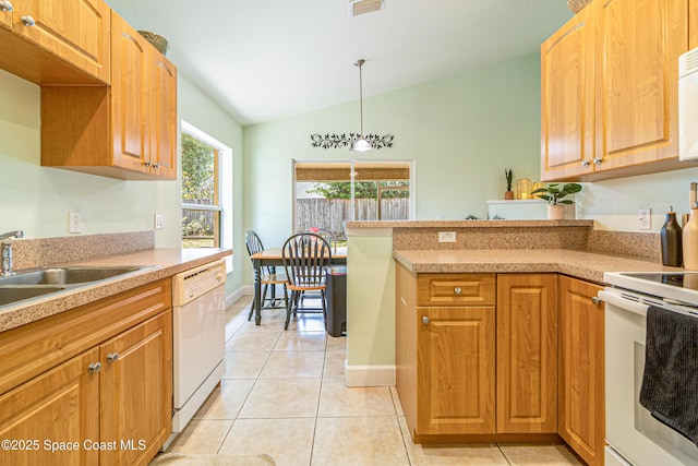854 Belhurst Ln, Rockledge, FL 32955 - kitchen with white appliances, lofted ceiling, light tile patterned floors, light countertops, and hanging light fixtures