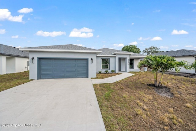 3350 Nancy St, West Melbourne, FL 32904 - prairie-style home featuring a garage, concrete driveway, stucco siding, a front yard, and roof with shingles