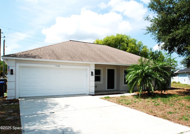 1558 Pentax Ave, Titusville, FL 32796 - ranch-style house featuring a shingled roof, stucco siding, and driveway