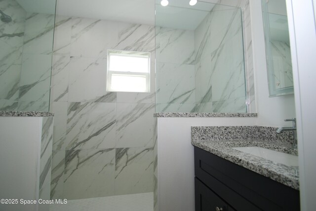 1558 Pentax Ave, Titusville, FL 32796 - full bath with vanity and a marble finish shower
