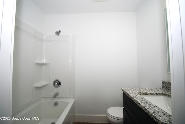 1558 Pentax Ave, Titusville, FL 32796 - bathroom with vanity, baseboards, toilet, and washtub / shower combination