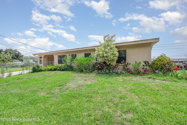 6519 June Dr, Cocoa, FL 32926 - view of front of home with stucco siding