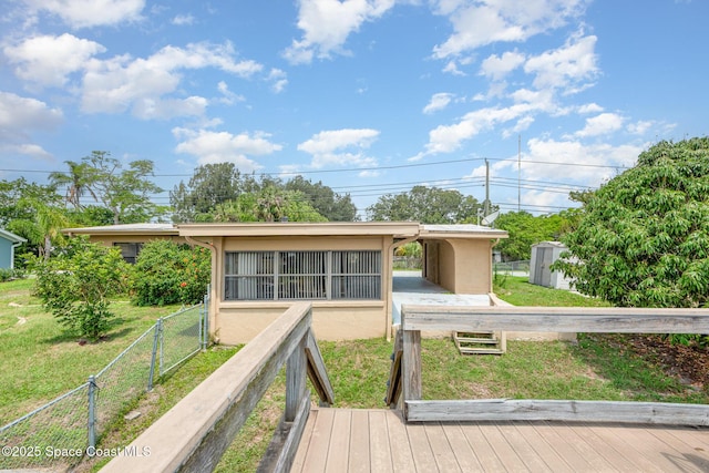 6519 June Dr, Cocoa, FL 32926 - rear view of property featuring stucco siding