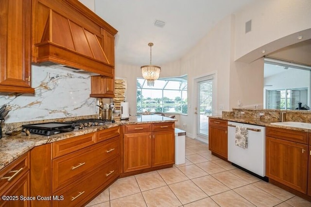 4178 Ventana Blvd, Rockledge, FL 32955 - kitchen featuring dishwasher, custom range hood, brown cabinetry, decorative backsplash, and a sink