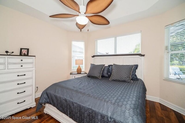 4178 Ventana Blvd, Rockledge, FL 32955 - bedroom featuring dark wood-style floors, baseboards, and a ceiling fan
