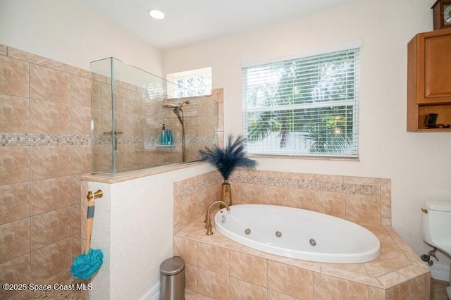 4178 Ventana Blvd, Rockledge, FL 32955 - bathroom with a whirlpool tub, walk in shower, and toilet