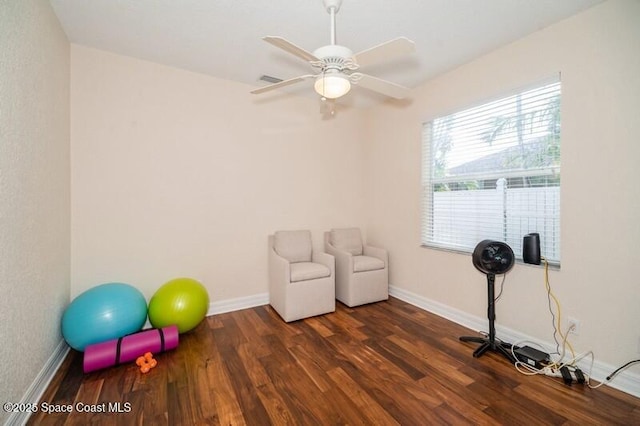 4178 Ventana Blvd, Rockledge, FL 32955 - workout area with wood finished floors, baseboards, and a ceiling fan
