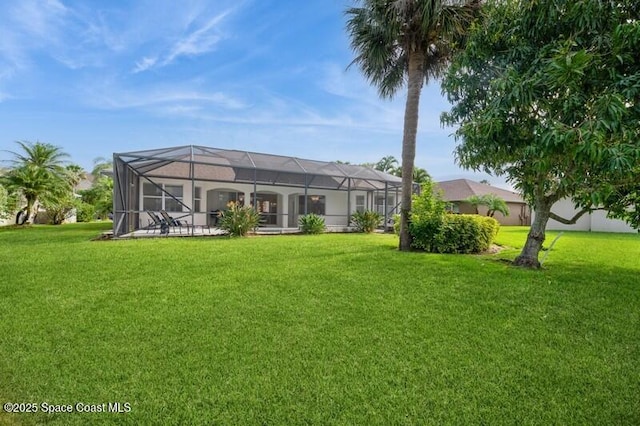 4178 Ventana Blvd, Rockledge, FL 32955 - rear view of house with a yard and a lanai
