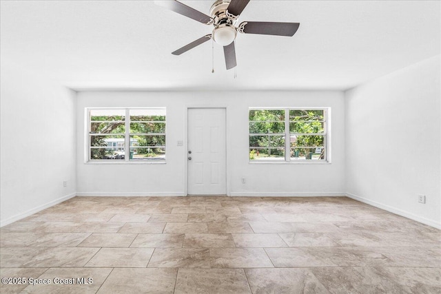 133 Lee Rd, Melbourne, FL 32904 - entrance foyer with a ceiling fan and baseboards
