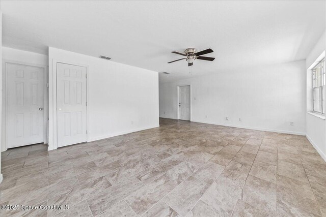 133 Lee Rd, Melbourne, FL 32904 - empty room featuring ceiling fan and baseboards