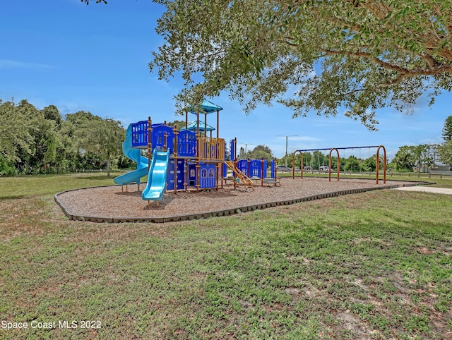 community playground with a lawn