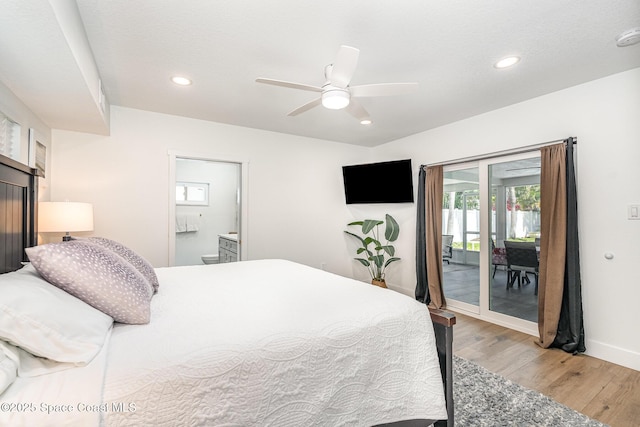 8103 Magnolia Ave, Cape Canaveral, FL 32920 - bedroom with access to exterior, light wood finished floors, baseboards, recessed lighting, and ensuite bath
