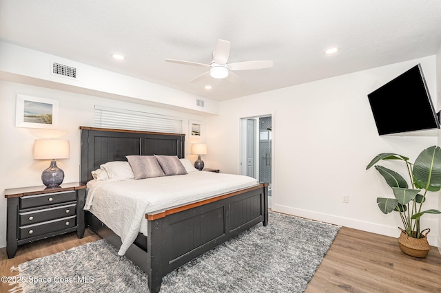 8103 Magnolia Ave, Cape Canaveral, FL 32920 - bedroom featuring wood finished floors, baseboards, recessed lighting, and a ceiling fan