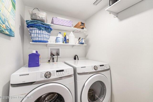 8103 Magnolia Ave, Cape Canaveral, FL 32920 - washroom featuring washer and clothes dryer