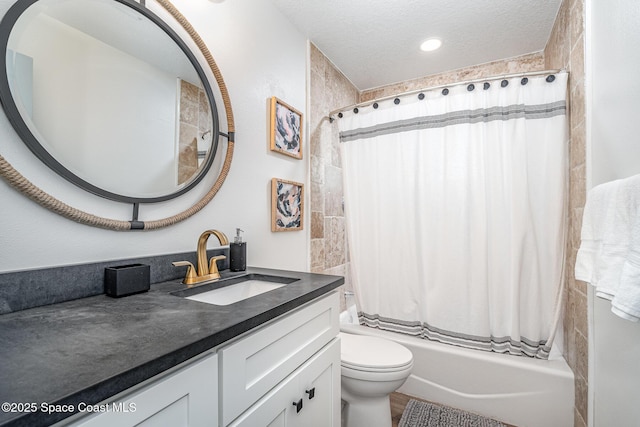 8103 Magnolia Ave, Cape Canaveral, FL 32920 - bathroom with shower / bath combo, vanity, a textured ceiling, and toilet