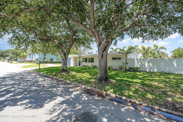 8103 Magnolia Ave, Cape Canaveral, FL 32920 - single story home with stucco siding