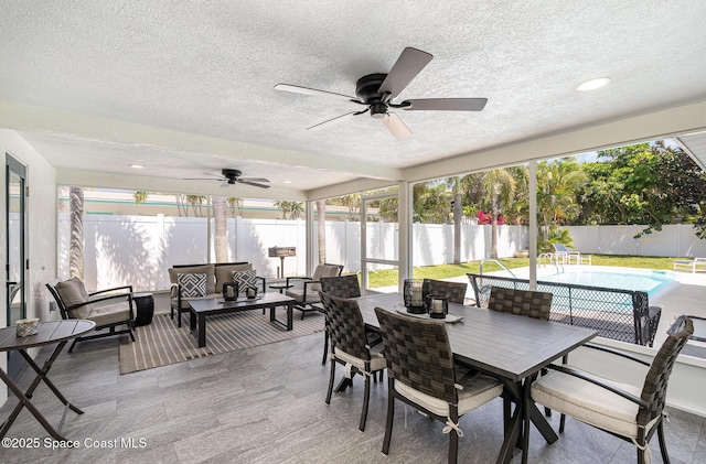 8103 Magnolia Ave, Cape Canaveral, FL 32920 - sunroom / solarium with a textured ceiling, plenty of natural light, and recessed lighting