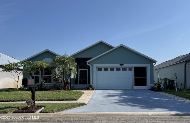 1775 Vista Lake Cir, Melbourne, FL 32904 - ranch-style house featuring concrete driveway, a garage, and a front yard