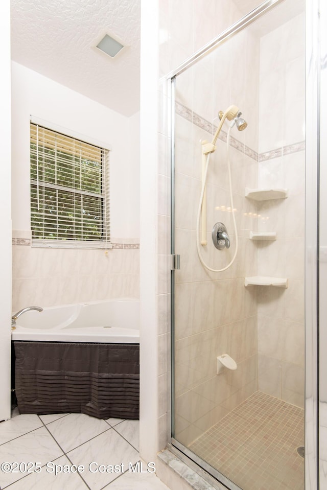 7030 Livingstone Ln, Melbourne, FL 32904 - full bathroom with a shower stall and a bath