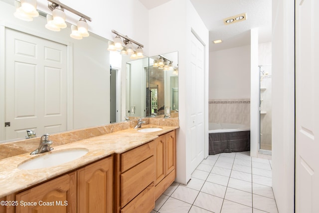 7030 Livingstone Ln, Melbourne, FL 32904 - full bath featuring a garden tub, double vanity, a chandelier, tile patterned floors, and a stall shower