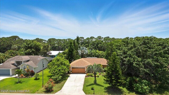 965 19th St SW, Vero Beach, FL 32962 - view of subject property featuring a forest