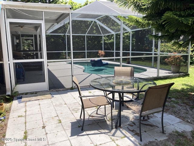 965 19th St SW, Vero Beach, FL 32962 - view of patio with an outdoor pool and glass enclosure